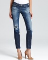 Distressing brings on-trend edge to these weekend-perfect skinnies from AG Adriano Goldschmied Jeans.