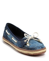 The boat shoe blends seamlessly with the ballet flat in this charming lace-trimmed shoe from KORS Michael Kors.