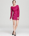 Short, sweet and sequined, this ABS by Allen Schwartz mini dress makes a standout exit with a low, scooped back.