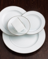 Uncover the elegance of this serving piece featuring a beautifully simple platinum rim. Keeps vegetable and side dishes warm so second helpings are as good as the first. Not shown.