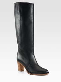 Build a chic ensemble with soft stitch-detailed knee boots in smooth, lustrous leather. Stacked heel, 3 (75mm)Shaft, 15Leg circumference, 15Leather upperPull-on styleLeather lining and solePadded insoleMade in ItalyOUR FIT MODEL RECOMMENDS ordering one size up as this style runs small. 