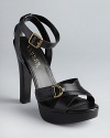 Timeless yet directional, Lauren Ralph Lauren has given these lofty platform sandals an equestrian aesthetic.