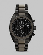 Classic chronograph functionality with a modern, sporty twist in stainless steel with a silicone bracelet. Round bezel Quartz movement Three-eye chronograph functionality Water resistant to 3 ATM Date function Second hand Stainless steel case: 43mm (1.69) Silicone bracelet: 23mm (0.90) Imported 