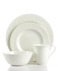 With an elegant white-on-white dinnerware pattern featuring an embossed vine motif and interior glaze, Opal Innocence Carved place settings from Lenox get your table set for refined dining every day.