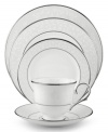 Pure opulence. Posh opalescence. This classically designed line of Lenox dinnerware and dishes is accented by a platinum rim and a delicate flourish of vine-like, white-on-white imprints with raised, iridescent enamel dots. Opal Innocence place settings make a great gift for housewarming parties, weddings...or yourself!