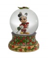 Jim Shore brings his unique folk art-inspired artistry to a beloved American icon in celebration of the holiday season. Holiday Mickey snow globe is sure to charm everyone on your list.