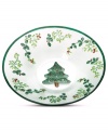 A classic holly motif and tree-green banding in textured glass make this Pfaltzgraff Winterberry serving bowl a festive addition to holiday tables.