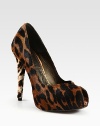 Leopard-print calf hair adds exotic edge to this towering silhouette, with a sexy peep toe and hidden platform. Self-covered heel, 5¼ (130mm)Hidden platform, 1 (25mm)Compares to a 4¼ heel (110mm)Leopard-print calf hair upperPeep toeScalloped edgesLeather lining and solePadded insoleMade in Spain