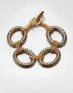 Large textured links accented with smaller wrapped link chains create an unique piece you'll wear again and again. Antique-finished goldtoneLength, about 7.75Toggle closureImported 