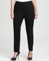 Rendered with a hint of stretch, these Tahari Woman Plus pants glide over your curves for a fluid, flattering silhouette.