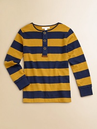 Bold rugby stripes on smooth knit have stand-out buttons and effortless style.Round necklineButton placket with signature tabLong sleeves with ribbed cuffsStraight hemCottonMachine washImported Please note: Number of buttons may vary depending on size ordered. 