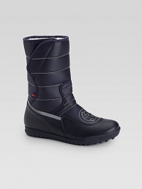 Unmistakeable GG stitching defines these waterproof nylon boots, accented with signature web detail.Grip-tape closureNylon upperFaux fur liningRubber solePadded insoleImported