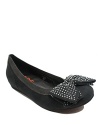 A sleek ballet flat is updated with an oversized studded bow, for a glamorous look guaranteed to wow.