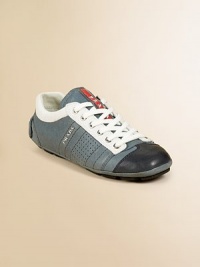 Lace-up with leather and logo detail.Lace-up closureLeather upperRubber soleImported