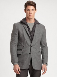 A modern combination of sleek sophistication and refined comfort, this sportcoat is expertly tailored in Italy from smooth, lightweight wool flannel featuring an interior tabard with a full-zip front and a ribbed-knit mockneck collar.Button-frontChest welt, waist flap pocketsSide vents80% cotton/20% nylonDry cleanMade in Italy