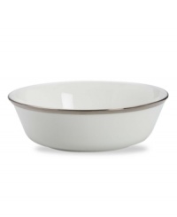 Beautiful in its simplicity, this dinnerware collection features a timeless, elegant design. The pristine white bone china is accented by a single, shimmering band of platinum. The understated beauty will add a refined sophistication to your dining experience for years to come. This all-purpose bowl is an essential serving piece for entertaining.