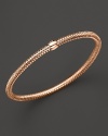 A modern mesh bangle in 18K rose gold from Roberto Coin.