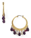 Dangling glass beads of rich colors dress up this pair of Lauren Ralph Lauren hoop earrings, which work a Moroccan vibe, framed in textured gold-plated metal.