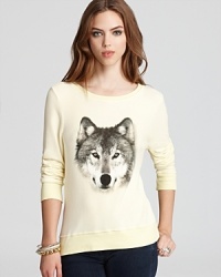 A realistic wolf print brings your animal instincts to the forefront of this WILDFOX sweatshirt for fall.