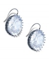 Juicy Couture's drop earrings showcase a shimmering crystal cut in an oval silhouette that lends a timeless look for the modern collection. Crafted in silver tone mixed metal with a sterling silver ear wire. Approximate drop: 1 inch.