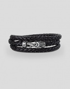 A subtle touch for every occasion in woven leather with a sterling silver clasp. Bracelet, about 25 long Strand, ¼ diam. Lobster clasp closure Made in USA