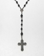 A simple, yet masculine addition to your ensemble, with a strand black onyx beads complemented by a sterling silver cross pendant.Sterling silverBlack onyxAbout 37, inner diam.About 7 dropImported