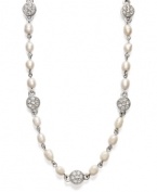 Embrace the rosary-style necklace trend with this elegant piece from Lauren by Ralph Lauren. Crafted in silver tone mixed metal with polished glass pearls and sparkling crystals. Approximate length: 18 inches.