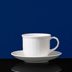 This eclectic service with its beautifully-detailed basket-style relief is an everyday white china for those who appreciate the unique. Bone china.