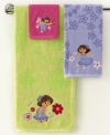 Go explorin'! Dora the Explorer is your go-to gal for a fun bath time with this Dora Picnic washcloth. Features a cheerful Dora surrounded by fresh flowers and bright hues your kids will go crazy for.