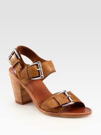 Oversized buckles and an adjustable slingback strap characterize this supple leather design. Stacked heel, 3 (75mm)Leather upperLeather lining and solePadded insoleImportedOUR FIT MODEL RECOMMENDS ordering one half size up as this style runs small. 