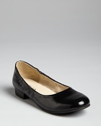 With a glossy finish and a small stacked heel, these classic flats are the ones to pair with her favorite party dress.