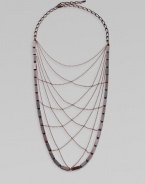 From the Art Deco Collection. A delicate but powerful web of crisscrossed chains edged by bold rectangular beads evokes a femme fatale look from the golden age of Hollywood.Hand-stained copperLength, about 17¾Lobster claspMade in USA