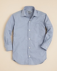 DKNY's mini-check button down shirt updates his dressy wardrobe with a versatile piece that adapts to his personal look.