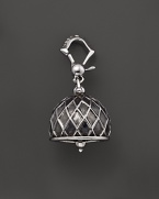 Inspired by Zen philosophy, this intricately detailed, blackened and polished sterling silver meditation bell from Paul Morelli jingles softly.