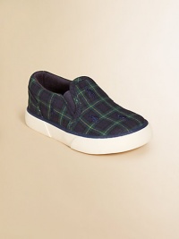 An adorable slip-on sneaker is rendered in durable preppy plaid canvas.Slip-on with elastic goreCanvas upperCotton canvas liningRubber solePadded insoleImported