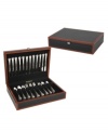 When you aren't entertaining, the Adams flatware chest from Reed & Barton stores more than a dozen place settings and serving pieces in soft, tarnish-resistant silver cloth. Imitation leather and cherry-finished wood veneer look as fine as its contents.