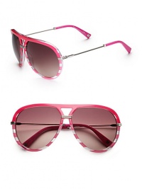 Give glamour a fun, vintage vibe with theses striped acetate frames. Available in fuchsia with lilac mirror gradient lens. Logo temples100% UV protectionMade in Italy 