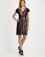 Wavy stripes lend a fascinating look to this colorful design with a waist-accentuating belt.V-necklineCap sleevesBelted designSolid trimFully linedAbout 37 from shoulder to hem67% cotton/22% linen/11% viscoseDry cleanImported Model shown is 5'10½ (179cm) wearing US size 4. 