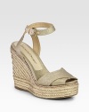 Espadrille wedge and canvas straps with a shimmering metallic finish. Hemp-covered wedge, 5 (125mm)Hemp-covered platform, 1 (25mm)Compares to a 4 heel (100mm)Metallic canvas and leather upperAdjustable ankle strapLeather and canvas liningRubber soleImported