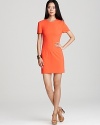 A simple, chic design pops in an electric hue--orange you glad DIANE von FURSTENBERG designed the Yazmine dress?