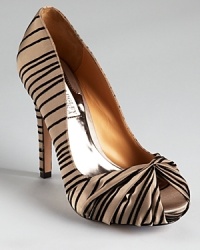 Badgley Mischka makes a striped statement with the Ryba pumps, boasting a flocked texture and a knotted peep toe.