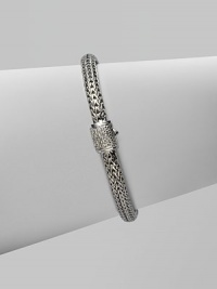 Diamond clasp accents sterling silver and 18K white gold chain bracelet. Pavé diamond, 0.17 tcw Push button close 7½ long Hand made in Bali