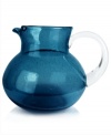 The eye-catching Iris pitcher makes a big impact in any setting with a cool slate-blue hue and tiny bubbles trapped in dishwasher-safe glass. From Artland's serveware collection.