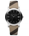 This Burberry timepiece features a Nova check fabric strap and round stainless steel case. Etched black dial with silvertone stick indices, logo and date window. Swiss made. Quartz movement. Water resistant to 50 meters. Two-year limited warranty.