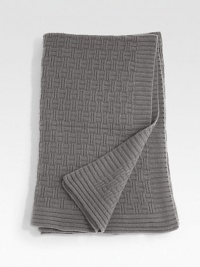 Richly textured in luxurious cashmere, inviting in any setting. 12-ply yarn 56 X 72 Cashmere; dry clean Imported