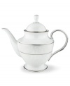 This elegant teapot is accented with a delicate flourish of vine-like, white-on-white imprints with raised, iridescent enamel dots. Holds 40 oz. From Lenox's dinnerware and dishes collection.