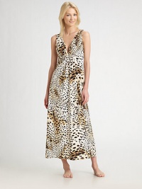 Exotic leopard-print falls to the floor in this beguiling v-neck design.Wide shoulder straps Gathered bodice Empire waist About 52 from shoulder to hem Polyester; machine wash Imported