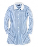 The classic shirtdress is rendered in lightweight cotton poplin and updated with a pretty stripe and pintuck detailing.