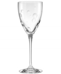 A nice surprise, this wine glass from the Society Hill crystal stemware collection features pressed dots and clean lines in luminous crystal from kate spade new york.