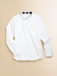 A wardrobe staple in crisp cotton with a check collar lining and embroidered Burberry logo.Button-down collarLong sleeves with button cuffsButton-frontPatch pocketCottonMachine washImported Please note: Number of buttons may vary depending on size ordered. 